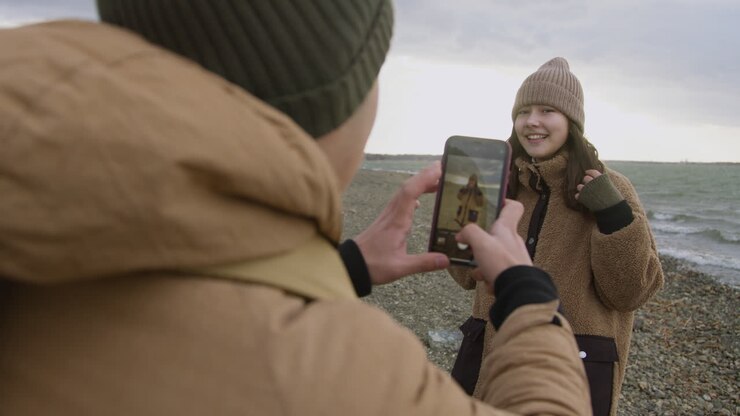 A hand holding a photograph in a quiet moment of remembrance